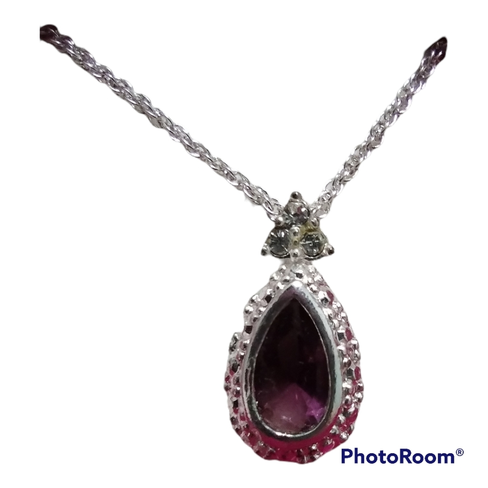 Amethyst colored pear shaped necklace Avon new in box